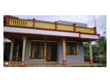 Dijual tanah datar area perkebunan kelapa + 5 Rumah dekat Pantai Ujung Genteng